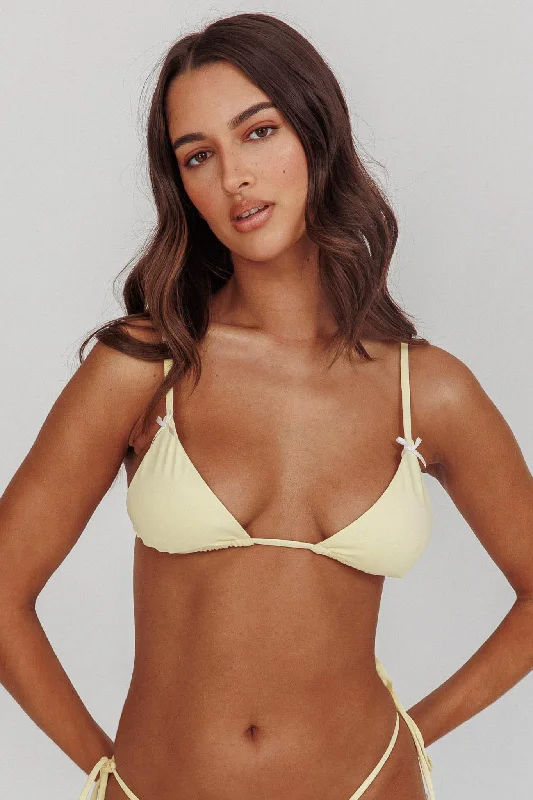 Printed bikini sets on sale with a floral - tropical pattern for a romantic and summery beach styleSovereign Triangle String Bikini Top With Bow Butter Printed bikini sets on sale with a floral - tropical pattern for a romantic and summery beach styleSovereign Triangle String Bikini Top With Bow Butter
