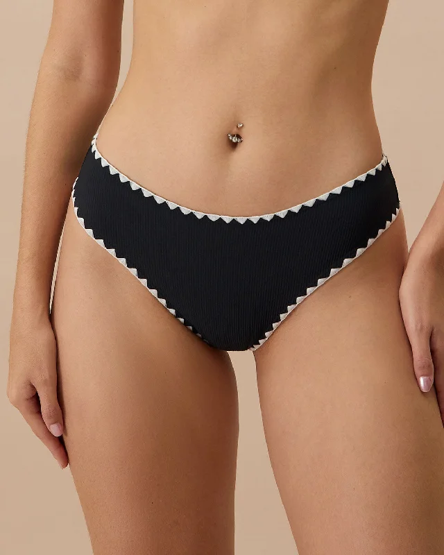 Sheer bikini sets on promotion with a lining for a bit of modesty and a touch of allureThe Black Contrast Ribbed Bikini Bottom Sheer bikini sets on promotion with a lining for a bit of modesty and a touch of allureThe Black Contrast Ribbed Bikini Bottom