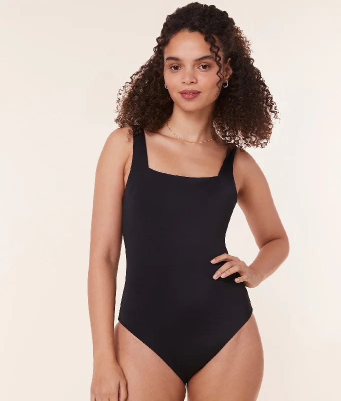 Ruffled bikini sets on special offer with a flirty top and bottoms for a fun and playful beach appearanceThe Miami One Piece - Eco Nylon - Black - Classic Ruffled bikini sets on special offer with a flirty top and bottoms for a fun and playful beach appearanceThe Miami One Piece - Eco Nylon - Black - Classic
