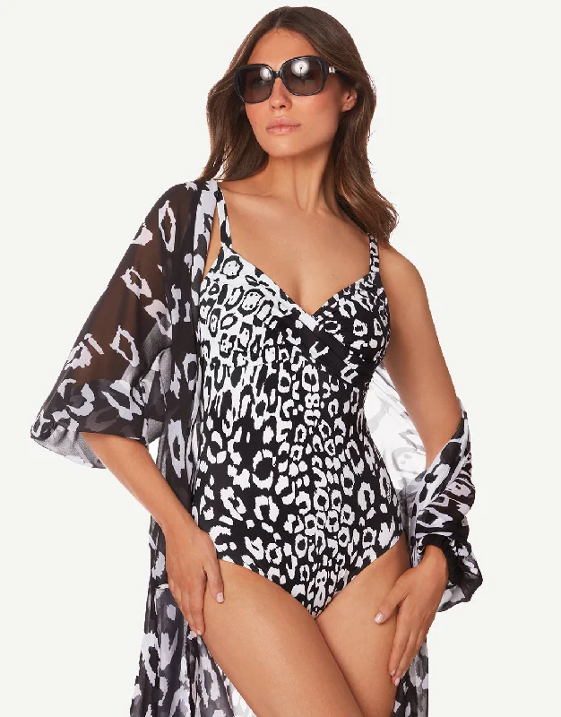 Boy short bikini sets on sale with a printed - stripe pattern for a fun and casual beach styleKalina Underwired Crossover Swimsuit - Black and White Boy short bikini sets on sale with a printed - stripe pattern for a fun and casual beach styleKalina Underwired Crossover Swimsuit - Black and White